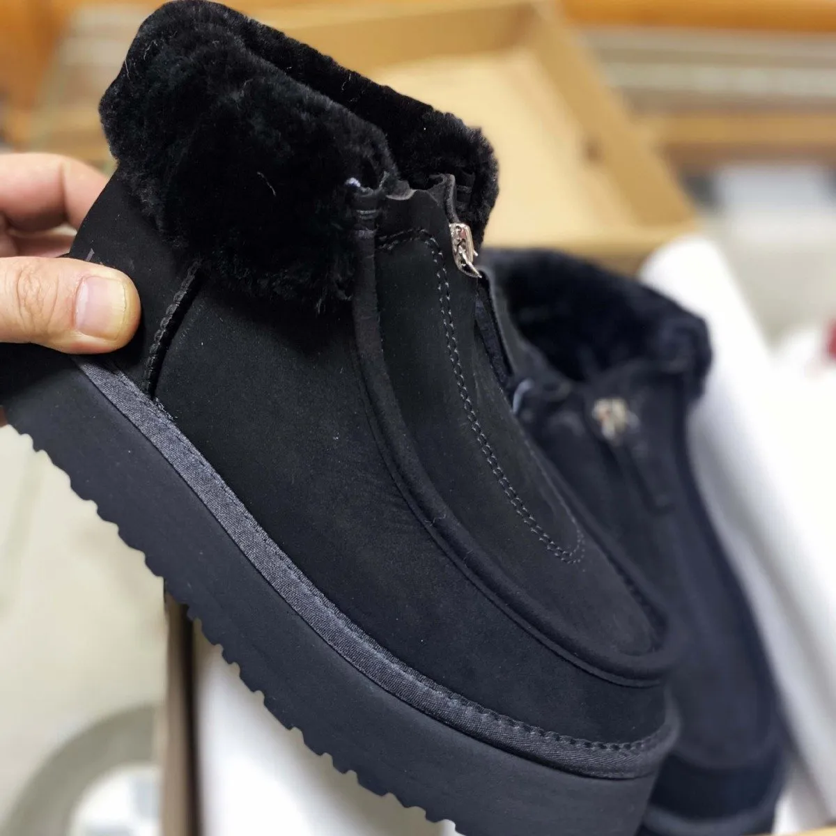 Front-zip shearling one-piece snow boots